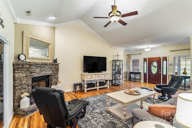 1622 Brookstone Dr, Hickory, NC 28602 - living area with a ceiling fan, wood finished floors, ornamental molding, vaulted ceiling, and a fireplace