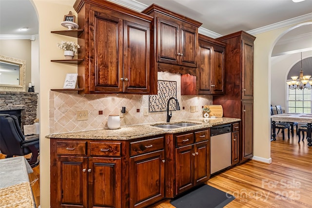 1622 Brookstone Dr, Hickory, NC 28602 - kitchen with dishwasher, open shelves, arched walkways, ornamental molding, and light wood-style flooring