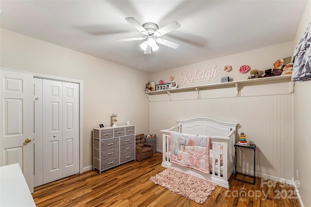 1622 Brookstone Dr, Hickory, NC 28602 - bedroom with wood finished floors, a closet, ceiling fan, and a nursery area