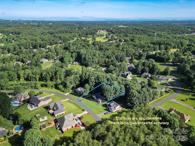 1622 Brookstone Dr, Hickory, NC 28602 - aerial view of property and surrounding area featuring a heavily wooded area and property parcel outlined
