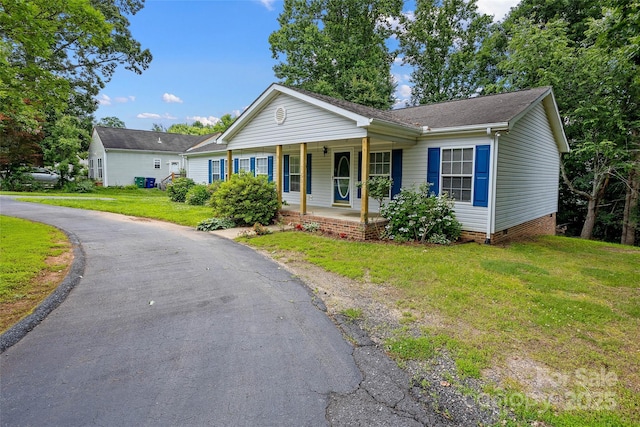 56 Founders Way, Arden, NC 28704 - view of front of home featuring covered porch, a front lawn, crawl space, and roof with shingles