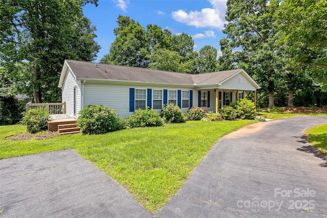 56 Founders Way, Arden, NC 28704 - single story home featuring a front lawn and a shingled roof