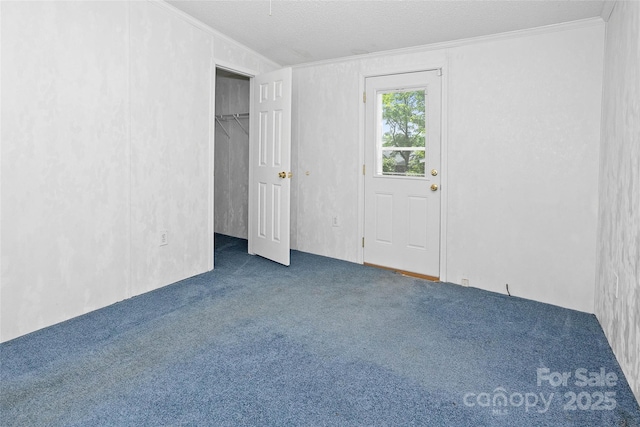 56 Founders Way, Arden, NC 28704 - unfurnished bedroom with ornamental molding, carpet, and a textured ceiling