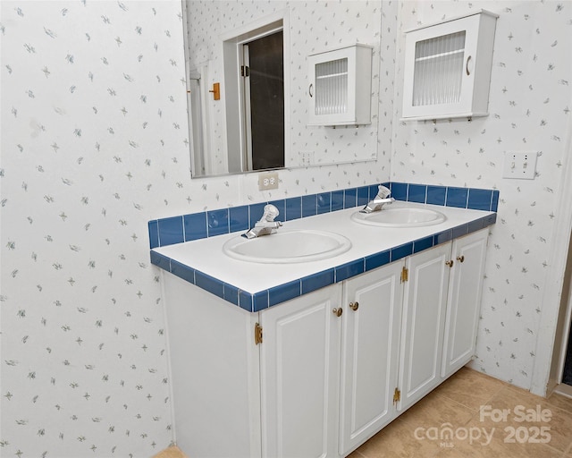 56 Founders Way, Arden, NC 28704 - bathroom with wallpapered walls, double vanity, and tile patterned flooring