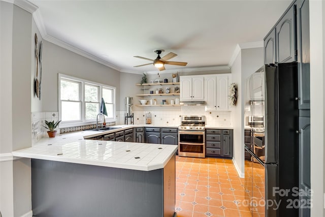 675 Ormand Rd, York, SC 29745 - kitchen featuring range with two ovens, a peninsula, gray cabinetry, freestanding refrigerator, and a ceiling fan