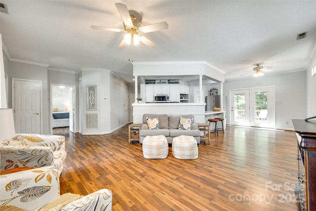 675 Ormand Rd, York, SC 29745 - living area featuring a ceiling fan, wood finished floors, and ornamental molding