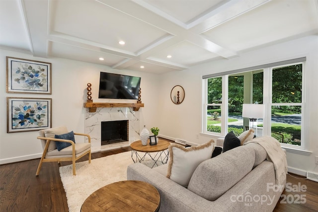 3165 Pendleton Ave, Charlotte, NC 28210 - living room featuring coffered ceiling, dark wood-type flooring, a fireplace, beamed ceiling, and recessed lighting