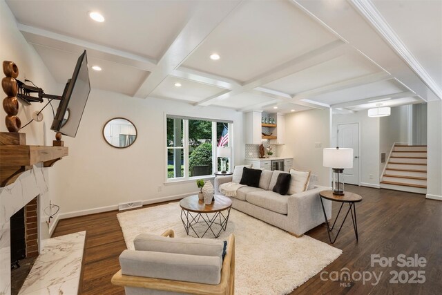 3165 Pendleton Ave, Charlotte, NC 28210 - living area featuring a premium fireplace, stairs, coffered ceiling, dark wood-style floors, and recessed lighting