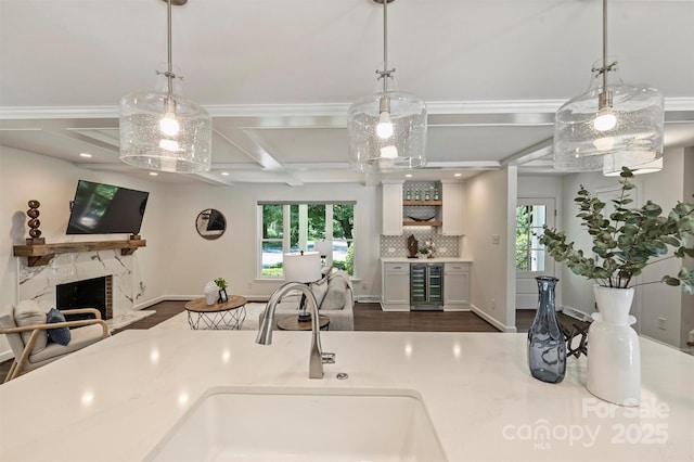 3165 Pendleton Ave, Charlotte, NC 28210 - kitchen with wine cooler, coffered ceiling, open floor plan, plenty of natural light, and dark wood-style floors