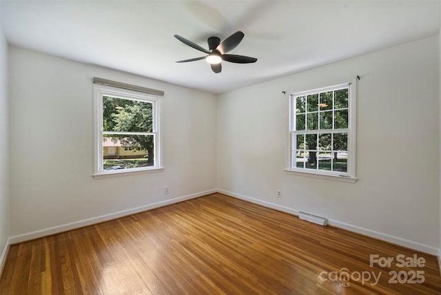 3165 Pendleton Ave, Charlotte, NC 28210 - spare room with hardwood / wood-style floors and ceiling fan