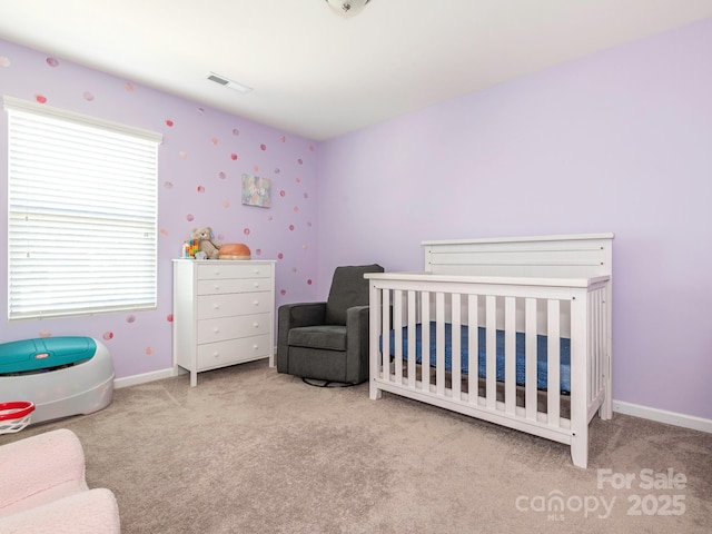 9123 Magnolia Lily Ave, Charlotte, NC 28227 - carpeted bedroom featuring a nursery area and baseboards