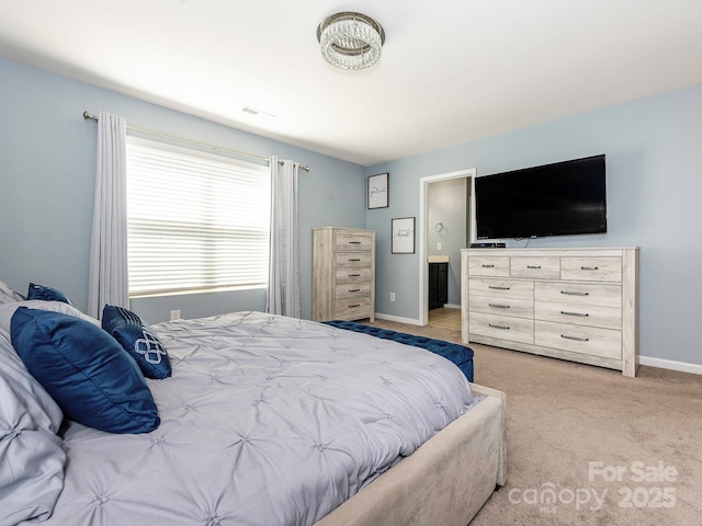 9123 Magnolia Lily Ave, Charlotte, NC 28227 - bedroom with light carpet and baseboards
