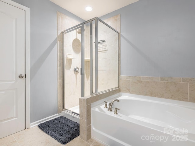 9123 Magnolia Lily Ave, Charlotte, NC 28227 - bathroom with a garden tub, a shower stall, and tile patterned floors