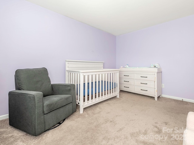 9123 Magnolia Lily Ave, Charlotte, NC 28227 - bedroom featuring carpet flooring and a nursery area