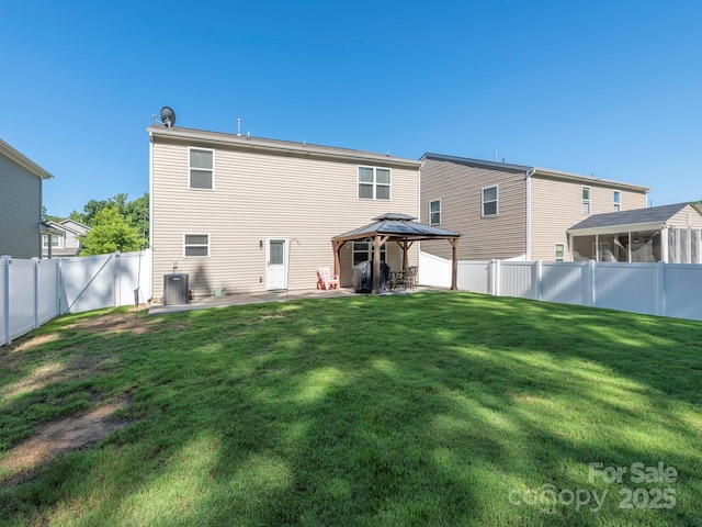 9123 Magnolia Lily Ave, Charlotte, NC 28227 - rear view of property featuring a gazebo, a patio area, a fenced backyard, and a sunroom
