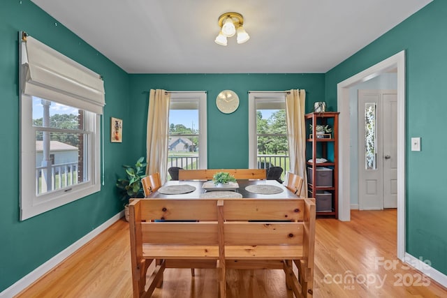 114 Windchime Ln, Mooresville, NC 28115 - dining space with wood finished floors and baseboards