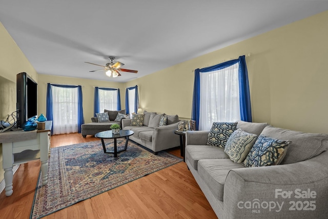 114 Windchime Ln, Mooresville, NC 28115 - living area with a ceiling fan and wood finished floors