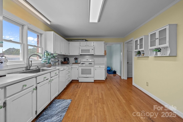 114 Windchime Ln, Mooresville, NC 28115 - kitchen featuring white appliances, white cabinetry, ornamental molding, and light countertops