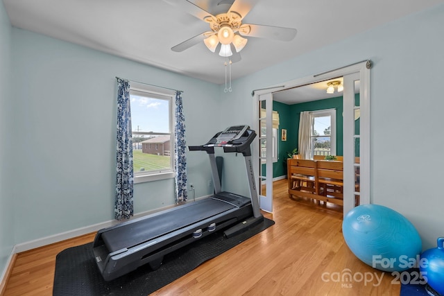 114 Windchime Ln, Mooresville, NC 28115 - workout area with wood finished floors, ceiling fan, and healthy amount of natural light