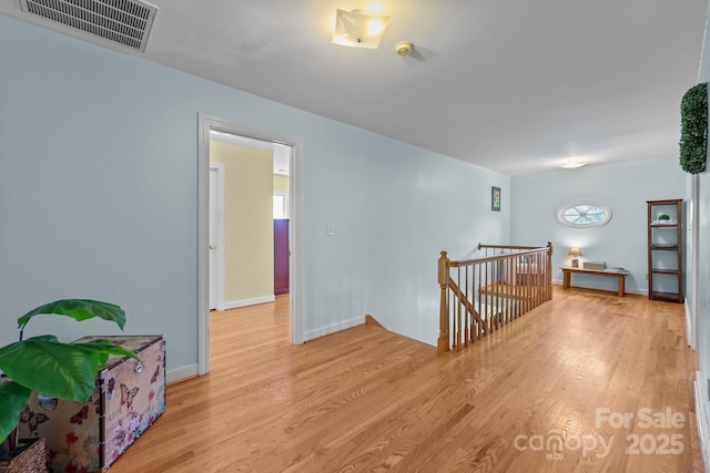 114 Windchime Ln, Mooresville, NC 28115 - hall featuring an upstairs landing, light wood-style flooring, and healthy amount of natural light