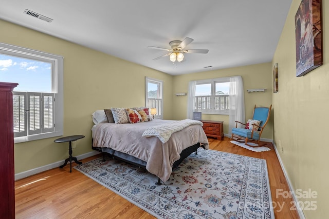 114 Windchime Ln, Mooresville, NC 28115 - bedroom with wood finished floors and ceiling fan