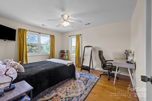 114 Windchime Ln, Mooresville, NC 28115 - bedroom featuring wood finished floors, an office area, and ceiling fan
