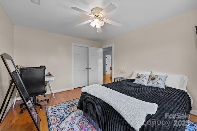 114 Windchime Ln, Mooresville, NC 28115 - bedroom with wood finished floors and ceiling fan