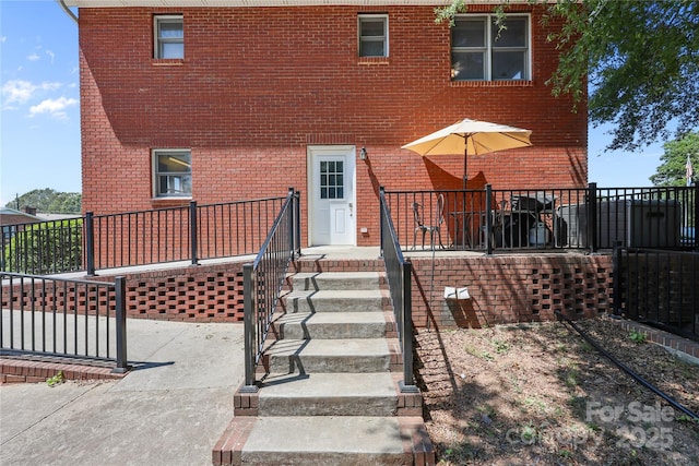 114 Windchime Ln, Mooresville, NC 28115 - back of property featuring brick siding