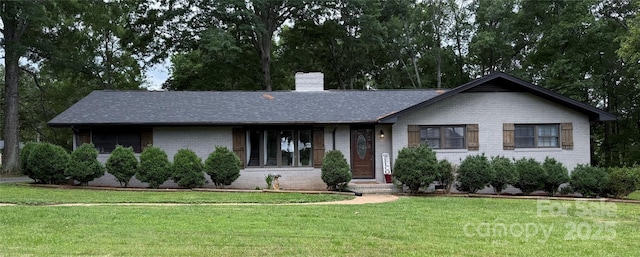 605 Impala Dr, Albemarle, NC 28001 - ranch-style home with a front lawn, brick siding, a chimney, and a shingled roof