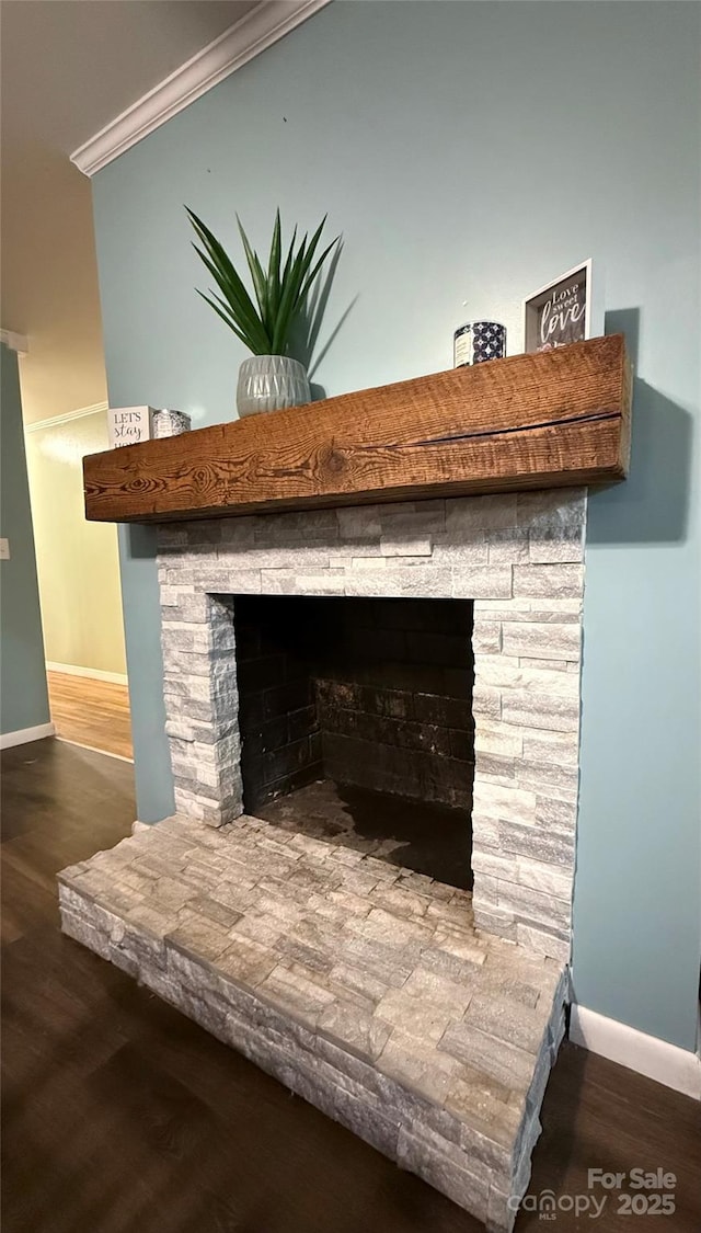 605 Impala Dr, Albemarle, NC 28001 - detailed view of wood finished floors, a fireplace, and crown molding
