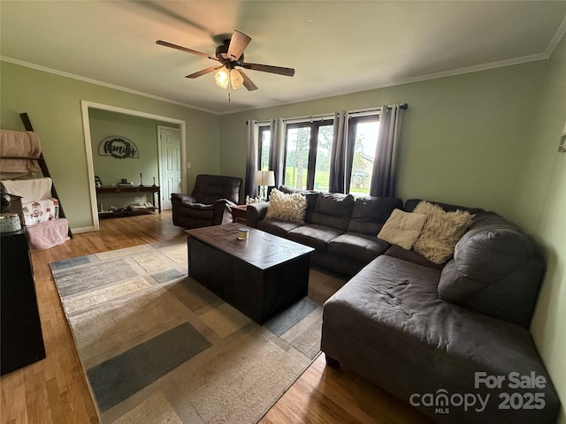 605 Impala Dr, Albemarle, NC 28001 - living room featuring wood finished floors, a ceiling fan, and crown molding