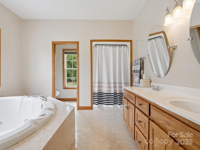 887 Living Waters Dr, Great Falls, SC 29055 - full bath featuring double vanity and a jetted tub