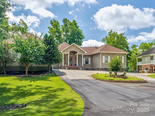 887 Living Waters Dr, Great Falls, SC 29055 - view of front of home featuring a front lawn, driveway, crawl space, roof with shingles, and a porch