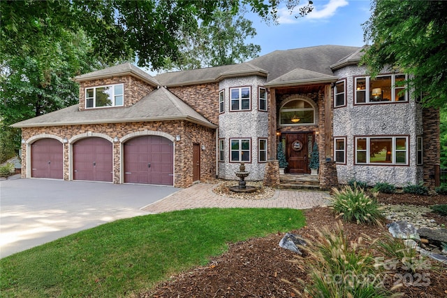 200 Lake Club Dr, Nebo, NC 28761 - view of front of home with driveway, an attached garage, and a shingled roof