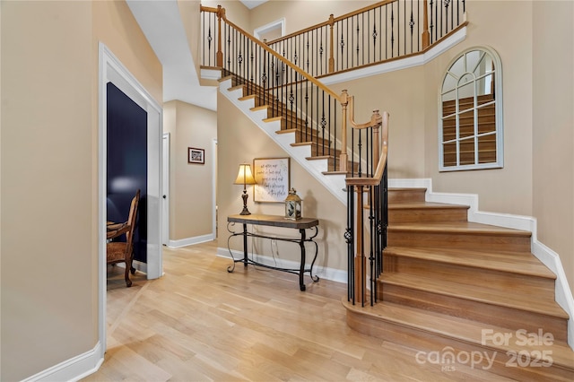200 Lake Club Dr, Nebo, NC 28761 - stairs with wood finished floors and a towering ceiling