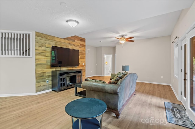 200 Lake Club Dr, Nebo, NC 28761 - living room with light wood-style floors and a ceiling fan