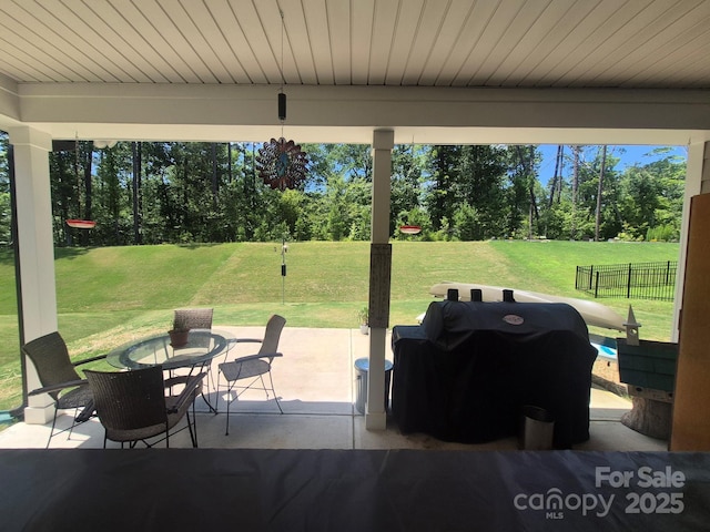 284 Old Harbor Dr, Mount Gilead, NC 27306 - view of patio / terrace featuring a grill and view of wooded area