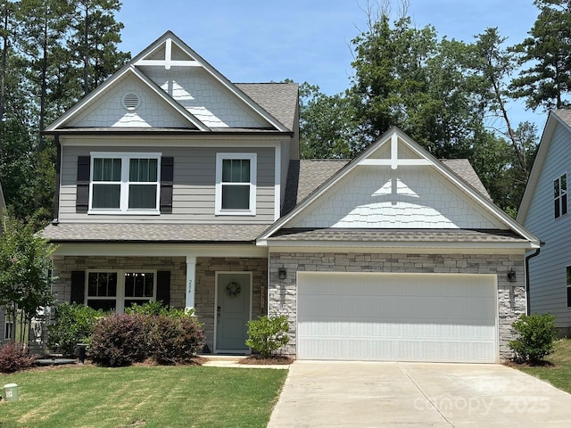 284 Old Harbor Dr, Mount Gilead, NC 27306 - craftsman house featuring a garage, concrete driveway, a shingled roof, a front lawn, and stone siding