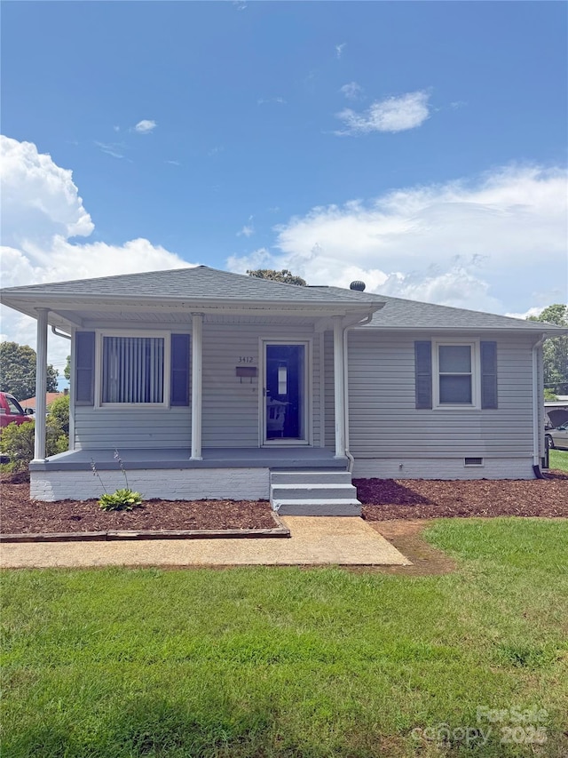3412 1st Avenue Cir NW, Hickory, NC 28601 - view of front of home with a porch, a front yard, crawl space, and a shingled roof