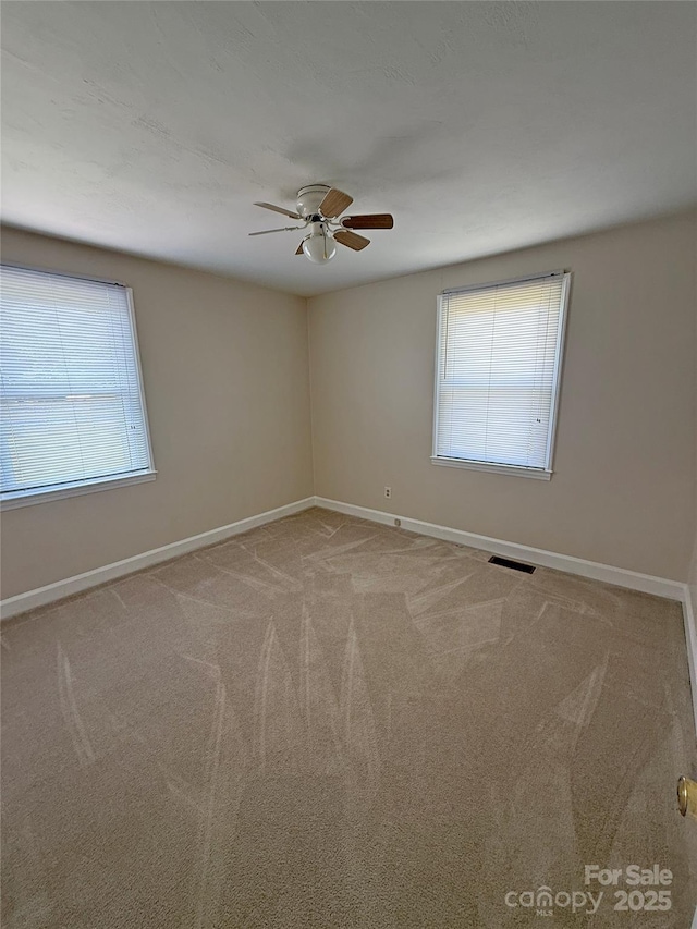 3412 1st Avenue Cir NW, Hickory, NC 28601 - spare room with ceiling fan and carpet floors