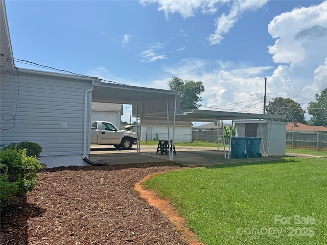 3412 1st Avenue Cir NW, Hickory, NC 28601 - view of yard featuring a carport and a garage