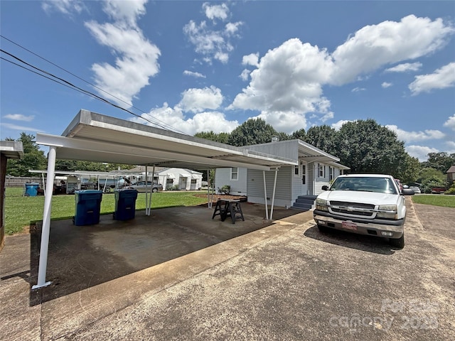 3412 1st Avenue Cir NW, Hickory, NC 28601 - view of front of house featuring a front yard and a carport