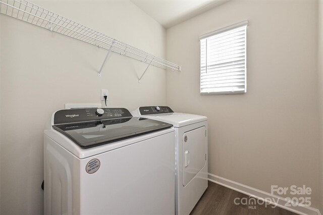 1434 31st St NE, Conover, NC 28613 - laundry room featuring washing machine and dryer and dark wood-style flooring