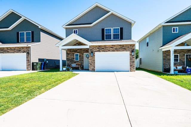 2526 Snow Creek Rd NE, Hickory, NC 28601 - craftsman-style house with a garage, stone siding, driveway, and a front lawn