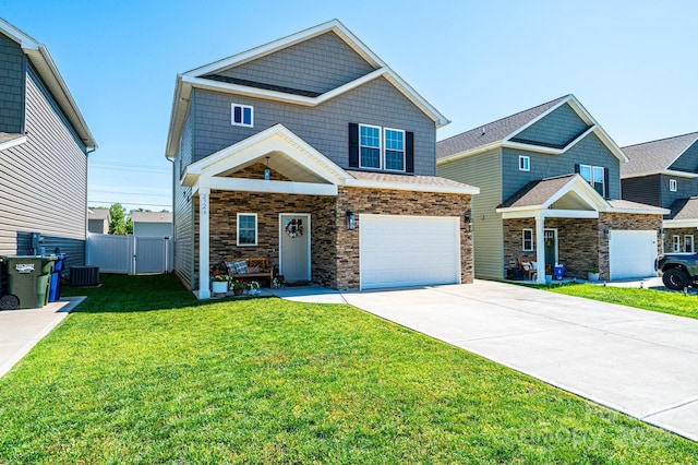 2526 Snow Creek Rd NE, Hickory, NC 28601 - craftsman house with driveway, an attached garage, a gate, and stone siding