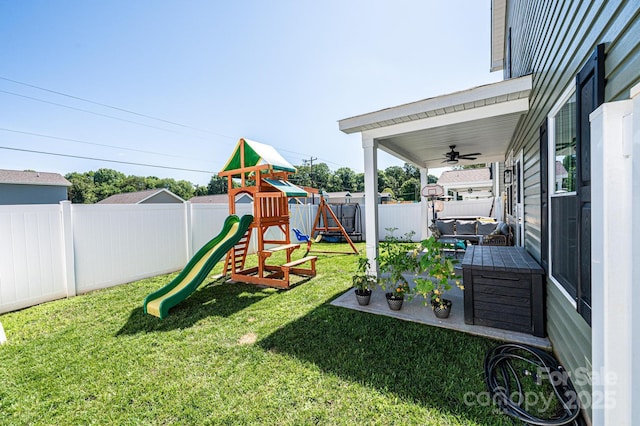 2526 Snow Creek Rd NE, Hickory, NC 28601 - fenced backyard featuring a playground and a ceiling fan