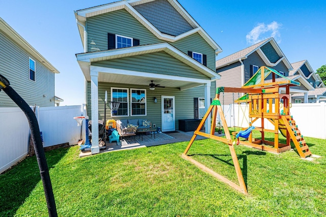 2526 Snow Creek Rd NE, Hickory, NC 28601 - rear view of property with outdoor lounge area, ceiling fan, a playground, a fenced backyard, and a patio area