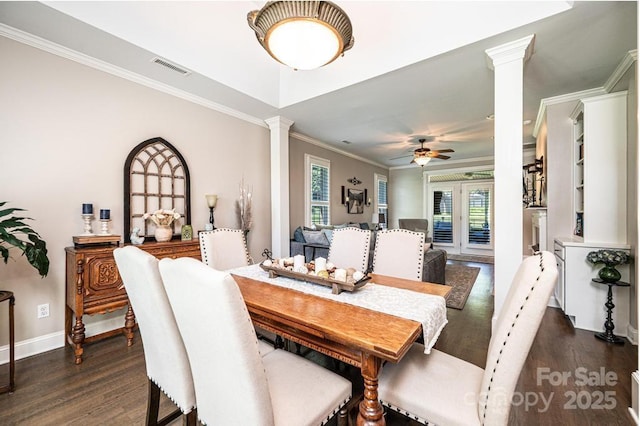1083 Fox Chase Dr, Newton, NC 28658 - dining room featuring ornate columns, dark wood-type flooring, ceiling fan, and crown molding