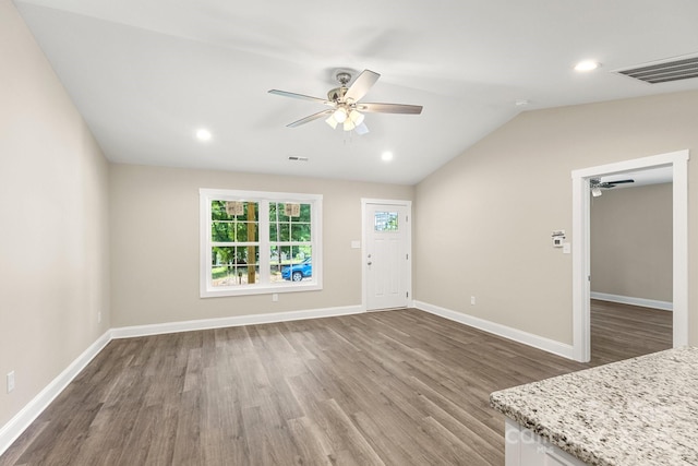 1234 Goodnight Ln, Kannapolis, NC 28081 - unfurnished living room featuring a ceiling fan, wood finished floors, lofted ceiling, and recessed lighting