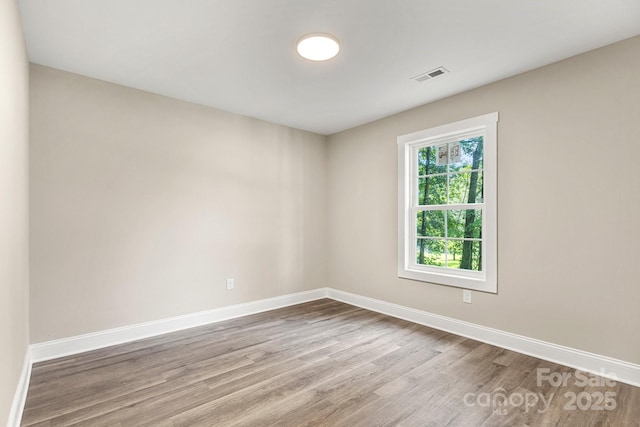 1234 Goodnight Ln, Kannapolis, NC 28081 - spare room featuring wood finished floors and baseboards